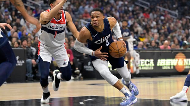 Los Angeles Clippers guard Russell Westbrook (0) drives past Washington Wizards guard Johnny Davis (1) in the first half of a game at Crypto.com Arena.